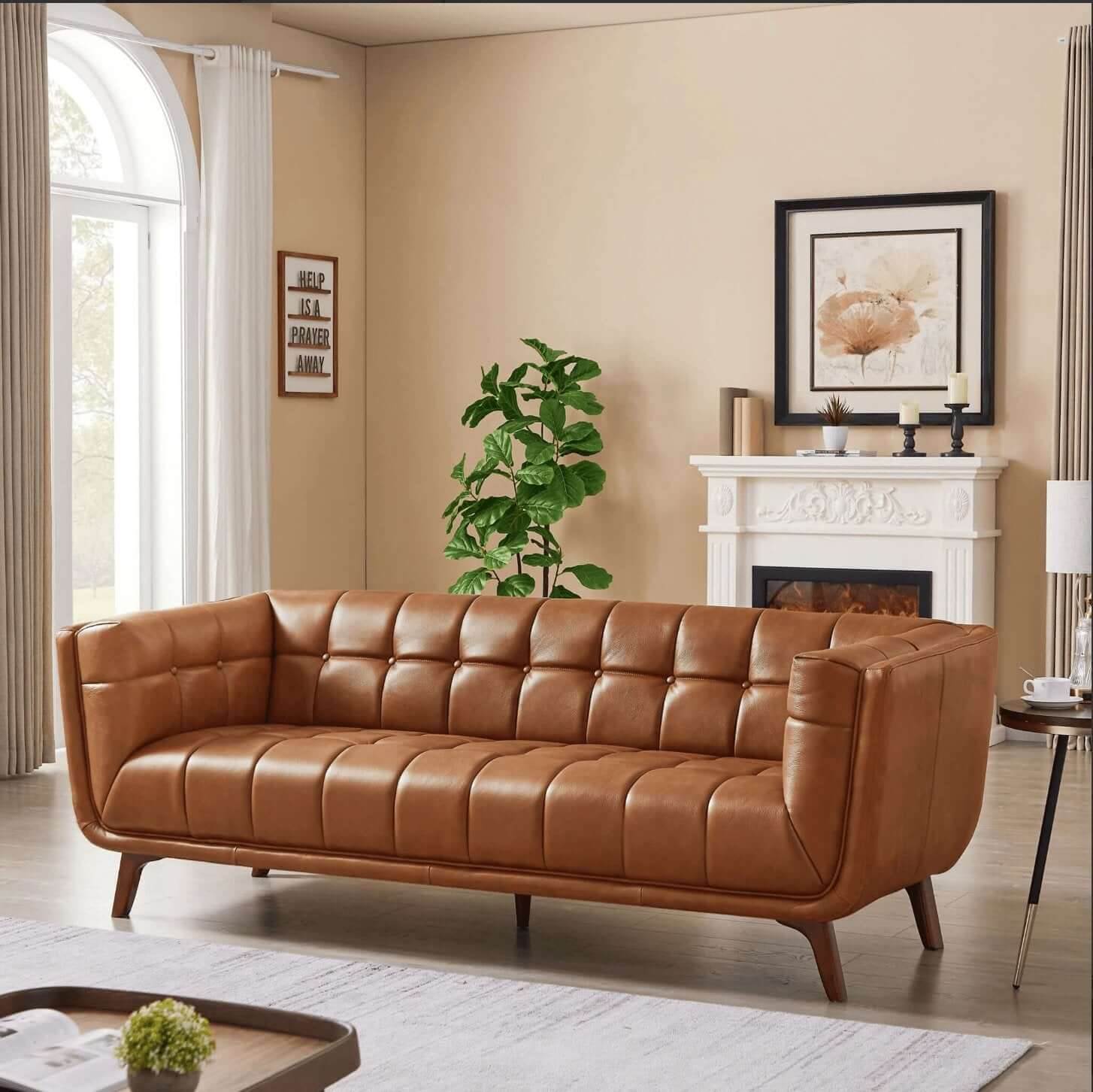 Addison MCM Styled Tufted Tan Leather Sofa Couch in modern living room setting with fireplace and decorative elements